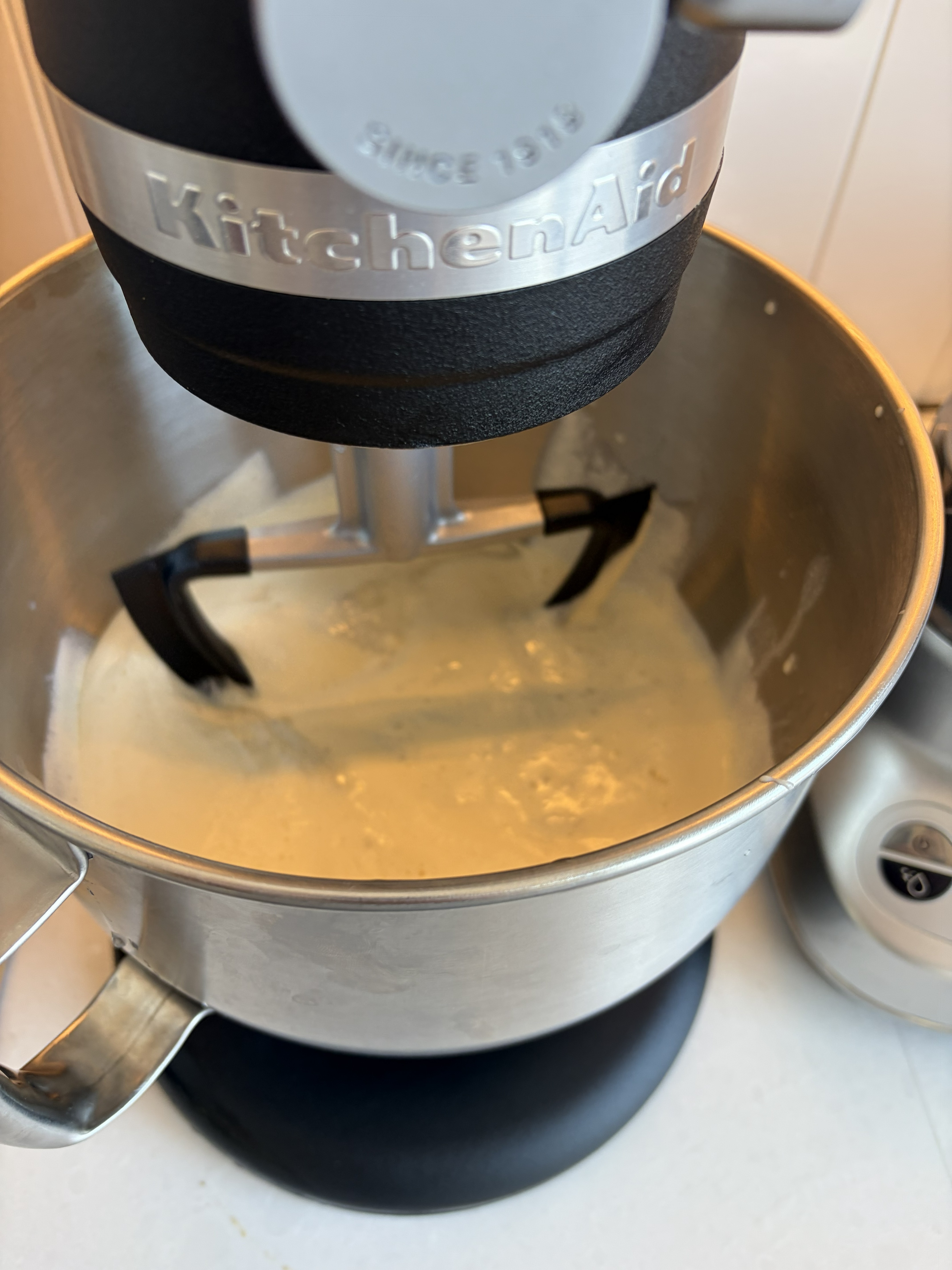 Mixing the feijoa, condensed milk, and cream together